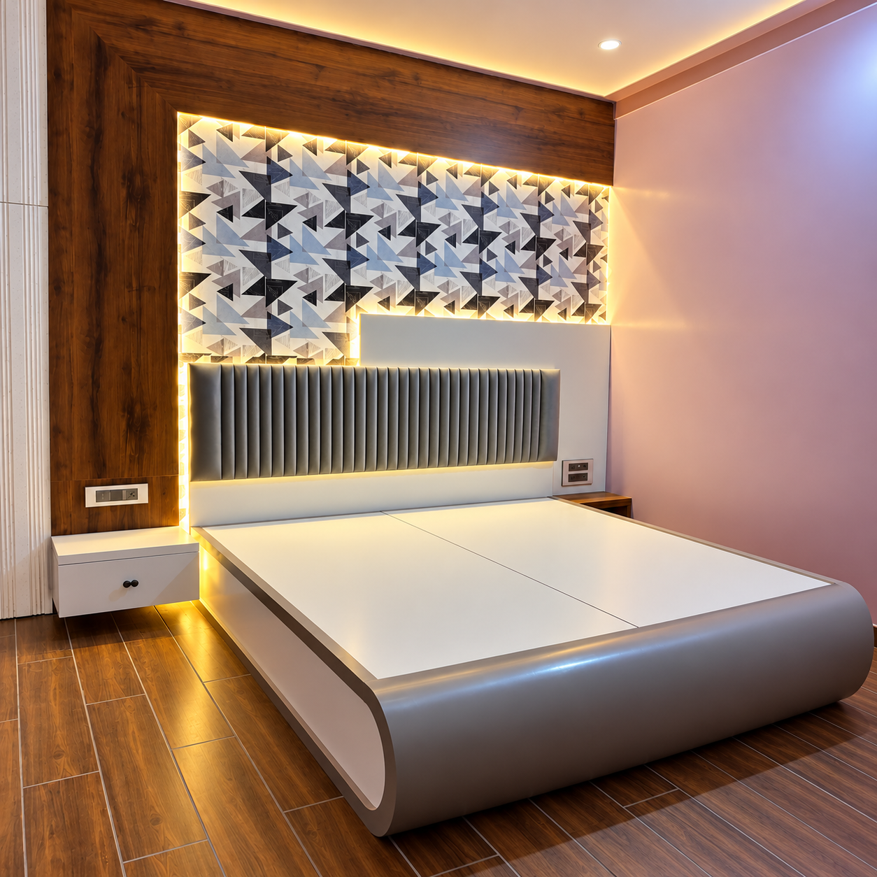 Luxury Bed with Curved Padded Base & Geometric Backlit Paneling